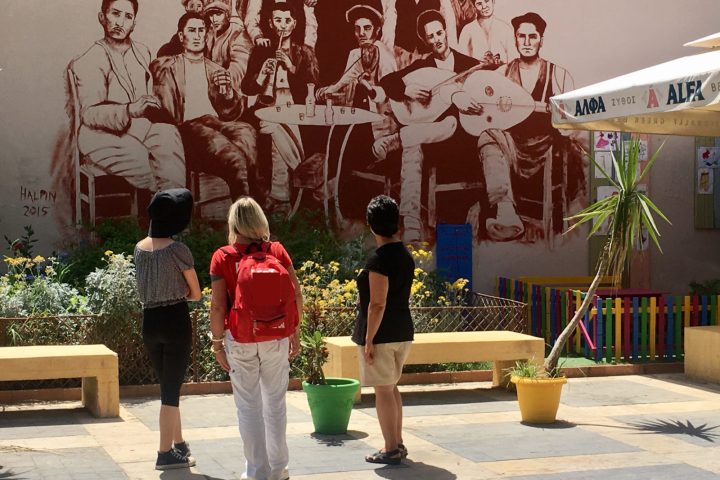 a group of people on a sidewalk