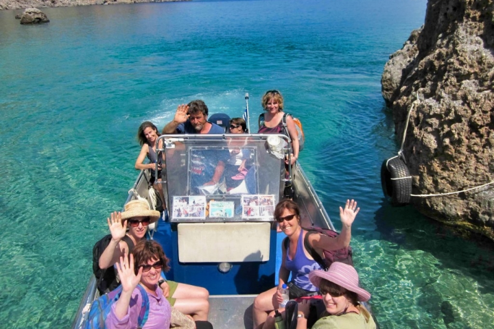 a group of people swimming in a body of water