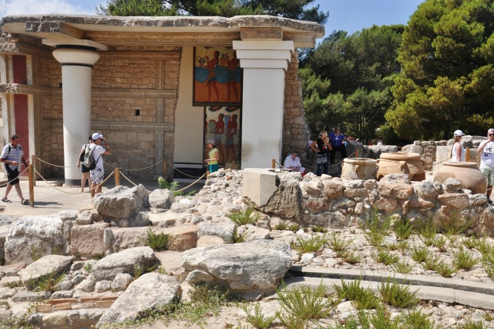 a group of people on a rock