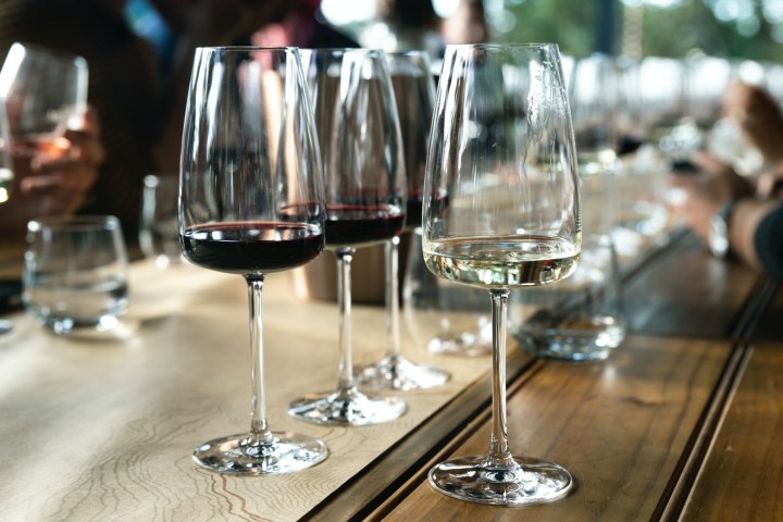 a glass of wine on a table